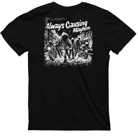 The Always Causing Mayhem - Black Heavyweight Tee by CaliforniaScumbags features an illustration of a hooded figure walking towards the viewer, flanked by motorcycles in a chaotic cityscape. The text "Always Causing Mayhem" is boldly displayed above. Perfect for those who embrace effortless style and embody the spirit of California Scumbags.