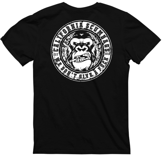 Introducing the CaliforniaScumbags Badge Of Honor - Black Heavyweight Tee, featuring a new logo on the back. The design depicts a grinning ape's face in the center, surrounded by the text "California Scumbags" and "We Don't Give a F*" along the border, with "EST 2016" at each side. Perfect for hardcore music fans.