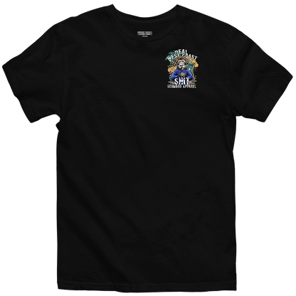 A black T-shirt featuring a colorful graphic on the upper left chest, infused with hardcore punk vibes. The design includes the text "Real West Coast Shit" and "CaliforniaScumbags" surrounding an illustrated character.