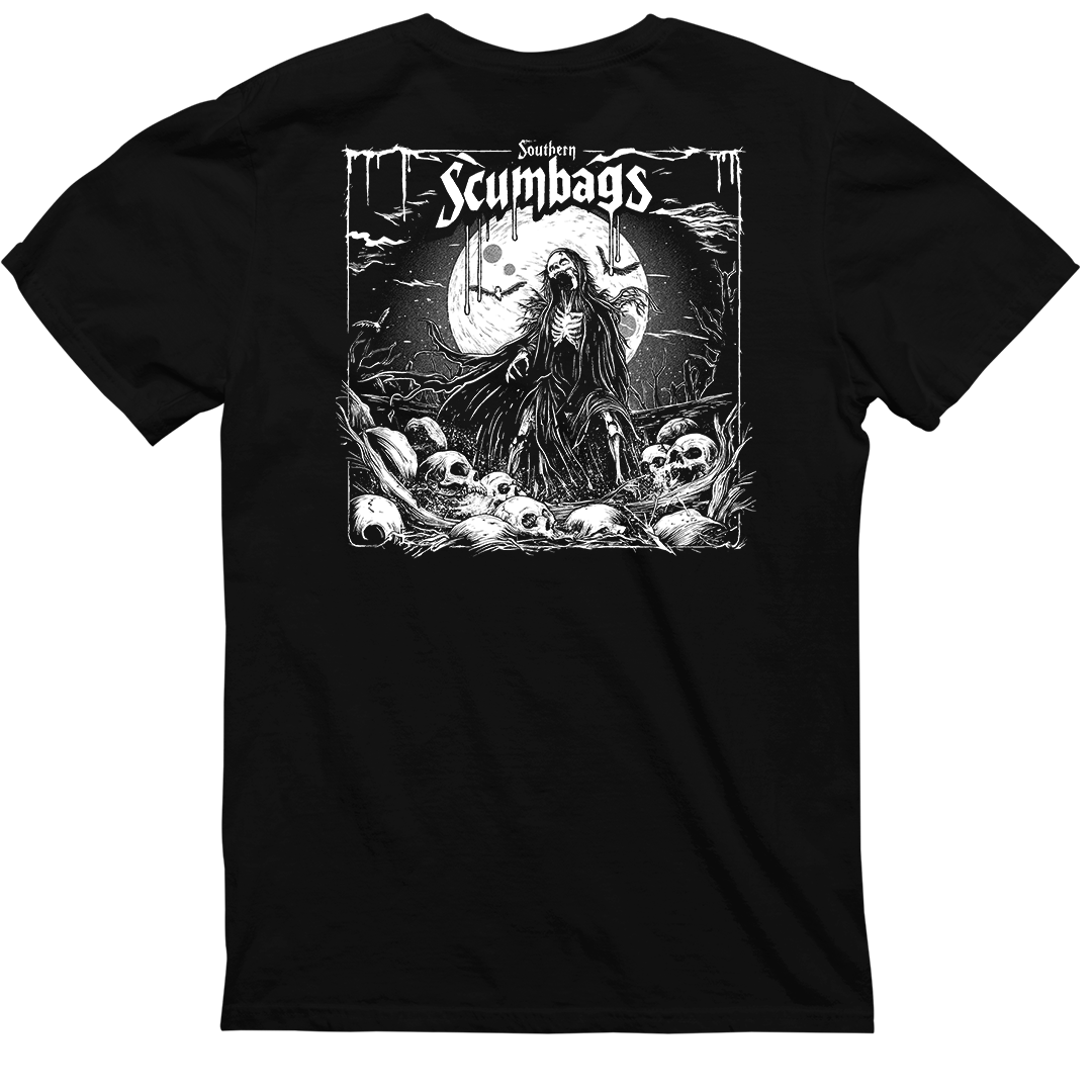 Black heavyweight T-shirt featuring a detailed illustration on the back of a robed, skeletal Soul Eater holding a scythe, standing amidst skulls and bones. In the background is a large, eerie moon. The top text reads "Southern Scumbags" in gothic font. This is the Southern Scumbags - Soul Eaters - Black Heavyweight Tee from CaliforniaScumbags.
